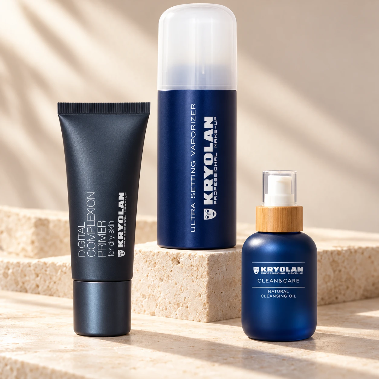 Ultra Setting Vaporizer, Digital Complexion Primer y Natural Cleansing Oil sobre fondo ivory con luz cálida